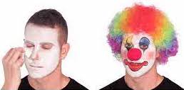 image of clown applying clown  makeup